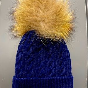 Brand new with tags: Navy Blue knit hat with puff
